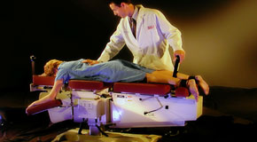 This is a picture of Cox Technic chiropratic spinal manipulation as performed at Most Chiropractic Clinic.